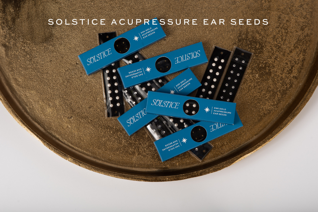 Solstice ear seeds on gold tray.